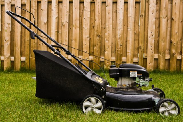 how to lower the blade on a push mower