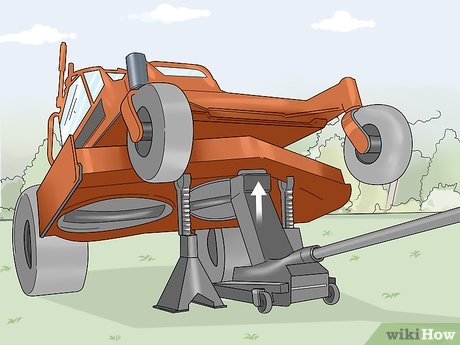 which way to loosen lawn mower blade