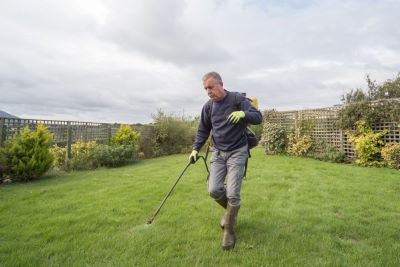 can you put weed killer on wet grass